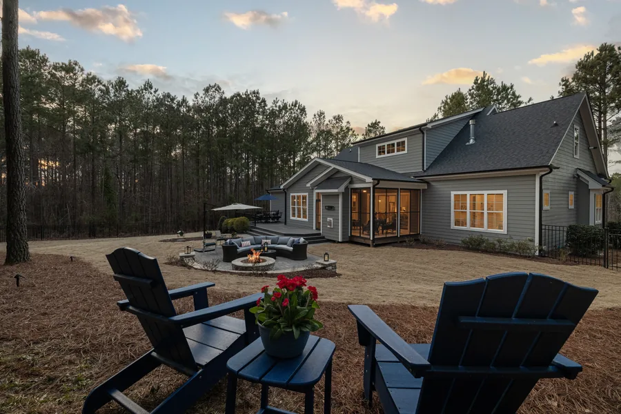 A finished patio with a fire pit and seating